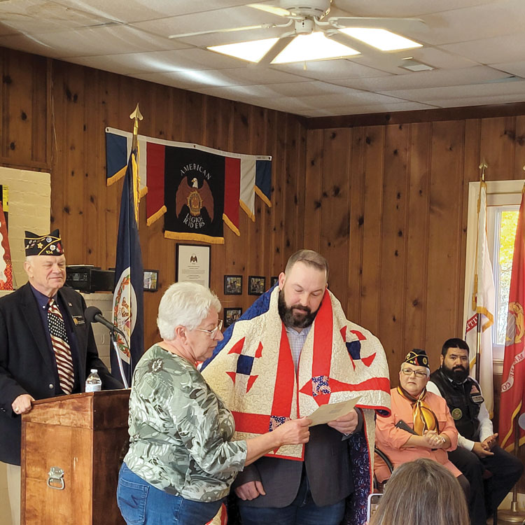Unit 104 member makes and presents 87 Quilts of Valor to veterans