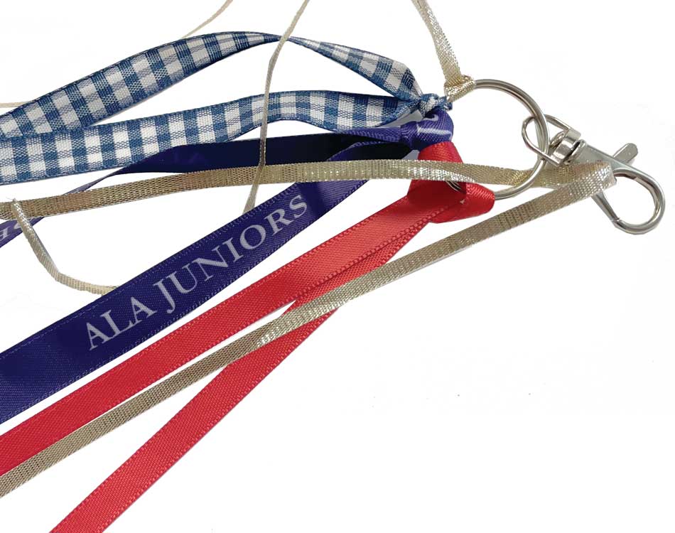 Juniors, young Sons learn to make patriotic fans, zipper pulls