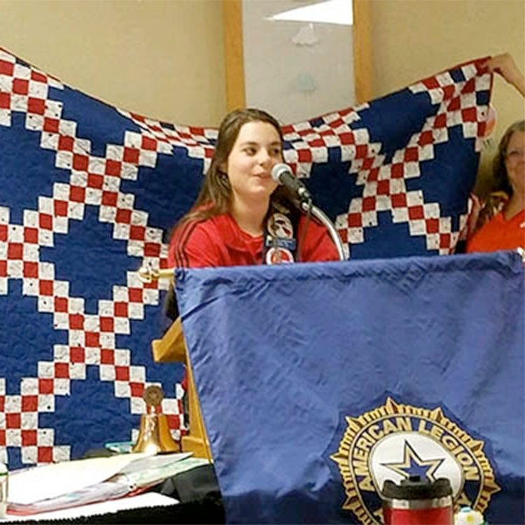 Junior member makes quilt and lap robes for veterans