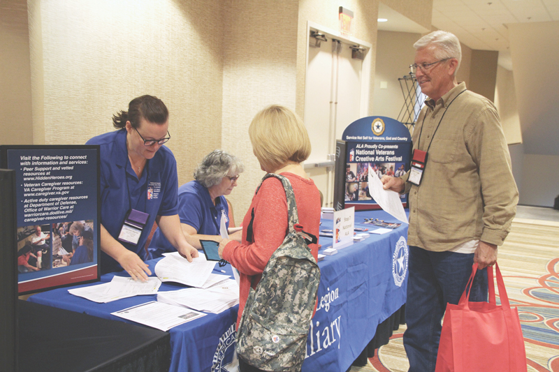 ALA staff hand out respite bags to caregivers.